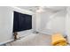 Bedroom featuring neutral carpet, a ceiling fan, one window covered, and a lamp at 2958 Paul Harris Rd, Dallas, GA 30157