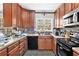 Functional kitchen equipped with modern appliances and rich wood cabinetry at 2958 Paul Harris Rd, Dallas, GA 30157