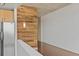 Living space with stainless fridge and wood accent at 361 17Th Nw St # 1708, Atlanta, GA 30363