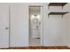 Stylish bathroom with round mirror, modern sink, and decorative black and white patterned flooring at 43 Lott Se Ave, Marietta, GA 30067