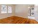 Cozy bedroom with hardwood floors and view into the laundry area at 43 Lott Se Ave, Marietta, GA 30067
