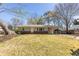 Charming single-story home with a well-maintained front yard and attached carport at 43 Lott Se Ave, Marietta, GA 30067