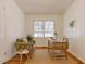 Bright home office with wood floors, comfortable seating, and a wooden writing desk at 43 Lott Se Ave, Marietta, GA 30067