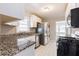 Functional kitchen featuring granite countertops and stainless steel appliances at 43 Lott Se Ave, Marietta, GA 30067