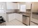 Updated kitchen featuring stainless steel appliances and granite countertops at 43 Lott Se Ave, Marietta, GA 30067