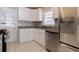 Updated kitchen with stainless steel appliances, and granite countertops at 43 Lott Se Ave, Marietta, GA 30067