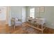 Bright home office with hardwood floors, a wooden desk, and a comfortable chair at 43 Lott Se Ave, Marietta, GA 30067
