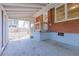 A covered patio with a screened-in porch and brick siding offers outdoor living space at 43 Lott Se Ave, Marietta, GA 30067