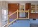Covered patio with access stairs, brick siding, and views of the backyard at 43 Lott Se Ave, Marietta, GA 30067