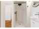 Bathroom shower featuring a rainfall shower head and sleek, modern fixtures at 43 Lott Se Ave, Marietta, GA 30067