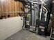 Unfinished basement area with water heater and Goodman furnace at 1106 Hardy Cir, Dallas, GA 30157