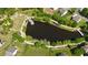 Aerial view of a lake and park in a beautiful community at 13 Oakside Nw Ct, Cartersville, GA 30121