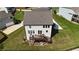 Aerial of a backyard featuring a spacious deck with outdoor seating, perfect for entertaining at 13 Oakside Nw Ct, Cartersville, GA 30121