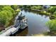 Picturesque pond with a charming gazebo and walking path, highlighting the community's serene setting at 13 Oakside Nw Ct, Cartersville, GA 30121