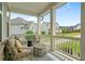 Inviting porch with comfortable seating, perfect for enjoying the outdoors and neighborhood views at 13 Oakside Nw Ct, Cartersville, GA 30121