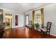 Spacious open floor plan with hardwood floors, neutral walls, and comfortable seating at 1608 Drakes Dr, Jonesboro, GA 30236