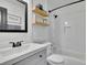 Modern bathroom with subway tile, white vanity, and a shower-tub combination at 3935 Manor House Dr, Marietta, GA 30062