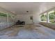 Spacious carport featuring a motorcycle and ample room for vehicle parking at 3935 Manor House Dr, Marietta, GA 30062