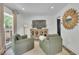 Cozy living room featuring modern decor, neutral colors, and bright natural light at 3935 Manor House Dr, Marietta, GA 30062