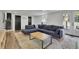 Basement living room with sofa and backyard access at 3935 Manor House Dr, Marietta, GA 30062