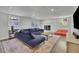 Finished basement living room with fireplace and lots of light at 3935 Manor House Dr, Marietta, GA 30062