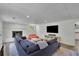 A finished basement with a living room and decorative fireplace at 3935 Manor House Dr, Marietta, GA 30062