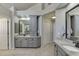 Elegant bathroom with double vanities, neutral colors, granite countertops, and tile flooring at 1315 Chattahoochee Run Dr, Suwanee, GA 30024