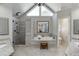 Bright bathroom with a large soaking tub, walk-in shower, and double vanity at 1315 Chattahoochee Run Dr, Suwanee, GA 30024