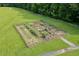 A fenced community garden with individual plots is perfect for residents to grow their own produce at 1315 Chattahoochee Run Dr, Suwanee, GA 30024