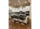 Modern kitchen featuring stainless steel appliances, granite counters, and a central island with bar stool seating at 1503 Riversedge Dr, Atlanta, GA 30339