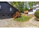 Private backyard featuring a well-maintained lawn and charming house exterior, perfect for outdoor relaxation and entertainment at 1900 Ridgewood Ne Dr, Atlanta, GA 30307