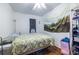 Cozy bedroom with a window, closet space, and natural decor at 1900 Ridgewood Ne Dr, Atlanta, GA 30307