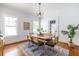 Charming dining room with hardwood floors, a decorative rug, and abundant natural light at 1900 Ridgewood Ne Dr, Atlanta, GA 30307