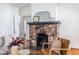 Living space featuring stone fireplace and classic details at 1900 Ridgewood Ne Dr, Atlanta, GA 30307