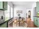 Bright and airy kitchen nook with green cabinetry and natural light at 1900 Ridgewood Ne Dr, Atlanta, GA 30307