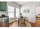 Breakfast nook with green cabinets offers a cozy spot in the kitchen at 1900 Ridgewood Ne Dr, Atlanta, GA 30307