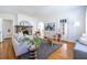 Cozy living room with stone fireplace, hardwood floors, and neutral furnishings at 1900 Ridgewood Ne Dr, Atlanta, GA 30307