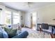 Comfortable living room with hardwood floors, a ceiling fan, and modern decor at 1900 Ridgewood Ne Dr, Atlanta, GA 30307