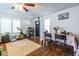 Inviting living room area with a dining space and exercise equipment near the front entrance at 1900 Ridgewood Ne Dr, Atlanta, GA 30307