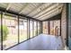 Enclosed back porch with natural light and views of the backyard at 1900 Ridgewood Ne Dr, Atlanta, GA 30307