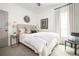 Cozy bedroom with neutral tones, plush bedding, and tasteful decor, creating a serene and inviting space at 588 Bismark Ne Rd, Atlanta, GA 30324