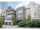 Charming townhomes featuring varied architectural styles and well-maintained landscaping at 588 Bismark Ne Rd, Atlanta, GA 30324