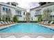 Inviting community pool surrounded by lounge chairs, offering a relaxing and resort-like atmosphere at 588 Bismark Ne Rd, Atlanta, GA 30324