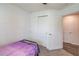 Bedroom featuring closet and entrance to hallway at 6550 Lantana Village Way, Cumming, GA 30028