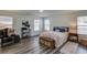 Inviting bedroom with plenty of natural light and modern decor at 6550 Lantana Village Way, Cumming, GA 30028