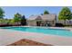 Community pool with ample seating and a shaded pavilion, ideal for summer relaxation and gatherings at 6550 Lantana Village Way, Cumming, GA 30028