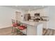 Bright kitchen featuring stainless steel appliances, granite countertops and breakfast bar seating at 6550 Lantana Village Way, Cumming, GA 30028
