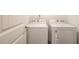 Laundry room featuring washer and dryer at 6550 Lantana Village Way, Cumming, GA 30028