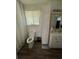 Clean bathroom with a functional vanity, a shower with curtains, and neutral tones at 6695 Cedar Hurst Trl, Atlanta, GA 30349