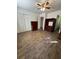 This bedroom features hardwood style floors and ample closet space at 6695 Cedar Hurst Trl, Atlanta, GA 30349